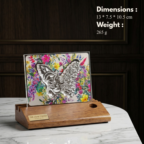 Decorative piece with butterfly design on a wooden stand, dimensions and weight displayed.