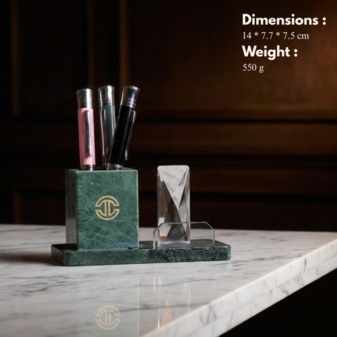 Green marble pen holder with a crystal on a marble surface, dimensions and weight displayed.