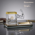 Glass pen stand with arm sculpture placed on a glass base, featuring 'The Craftsman' branding.
