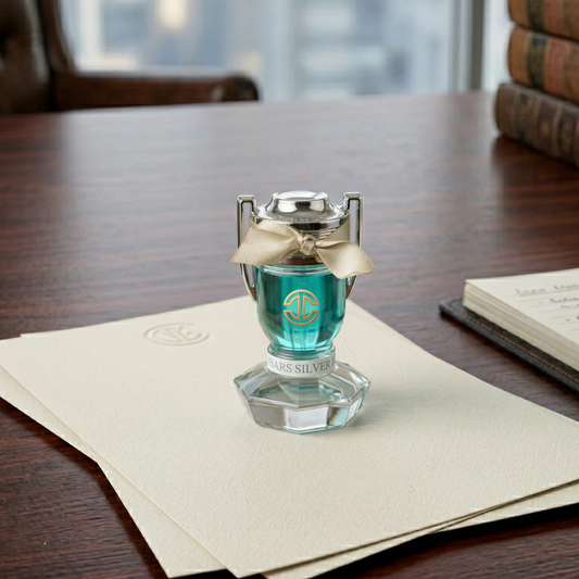 Blue trophy shaped perfume bottle  with Fragrance of waterfall also doubles as a paper weight  