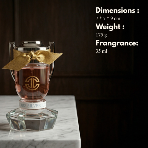 Perfume bottle with gold bow on a marble surface, dimensions, weight, and fragrance volume displayed.